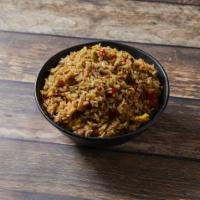 Arroz Chaufa de Pollo · Chicken fried rice prepared with red peppers, scalions, eggs