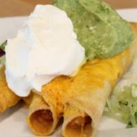 Flautas ala Carte · 3 rolled tacos topped with guacamole, sour cream, salsa fresca and cheese.