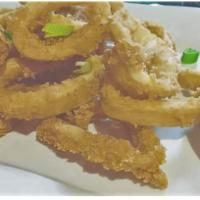 Fried Calamari · Coated in spiced flour and lightly fried, served with two sauces: hot and spicy & sweet and ...