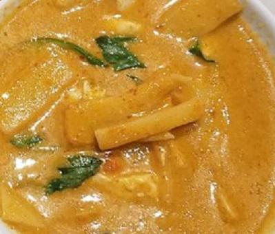 Red Curry · Milder curry with bamboo shoot and Thai basil. 