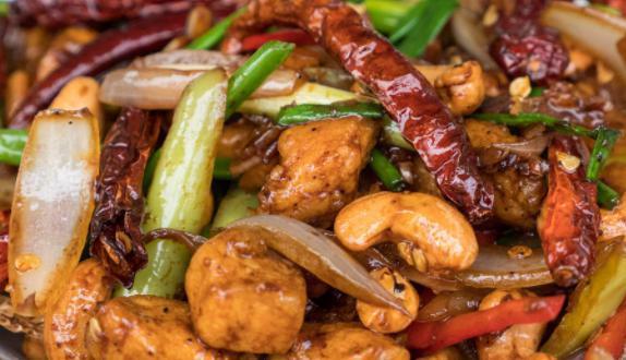 Cashew Nut · Choice of Meat [Chicken, Pork, Tofu, Beef, Shrimp, Combination] Bell peppers, onions, carrots, celery and soy chili sauce. Served with white rice.