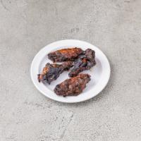 4 Pieces Jerk Wings · Marinated in a combination of Jamaican spices and sauce then grilled.