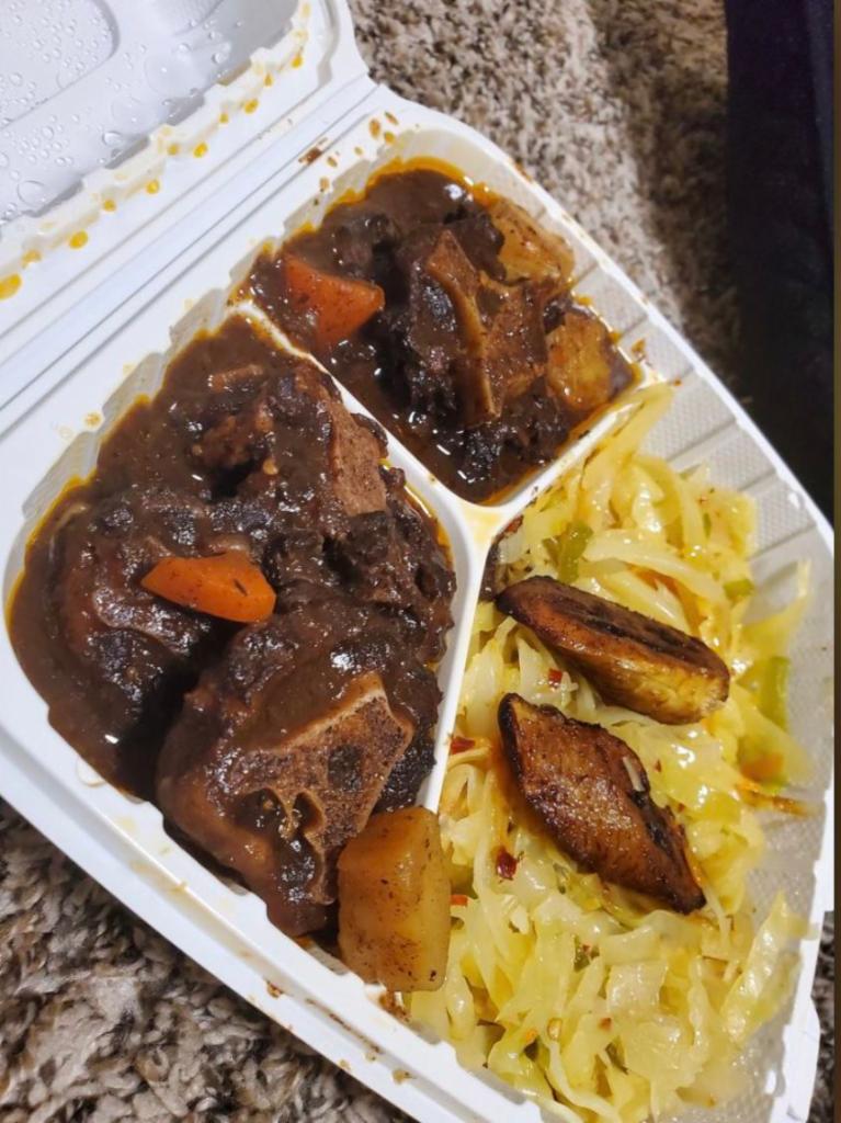 Oxtail9 · LARGE SIZE ONLY. Tender braised beef oxtail simmered in rich gravy. 