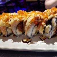 Kampai Dragon Roll · In: shrimp tempura, jalapeno and cream cheese. Out: eel, spicy tuna, green tobiko with eel s...