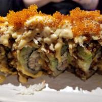 Super Godzilla Roll · In: hamachi and cream cheese. Out: avocado, deep-fried, crab meat, tobiko, eel sauce and spi...