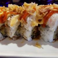 Gilroy Roll · In: shrimp tempura, cucumber and spicy tuna. Out: imitation crab, fried garlic, eel sauce, s...