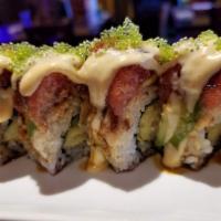 Kampai Ultimate Roll · In: shrimp tempura, spicy tuna, crab meat and asparagus. Out: assorted fish, tobiko, nuts, e...