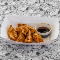 Fried Dumplings  · 7 pieces. Deep fries stuff pork and vegetables wrapped in wonton paper, served with sweet so...