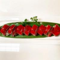 Crazy Tuna Roll  · Spicy tuna, crunch topped with peppered tuna and Sriracha.