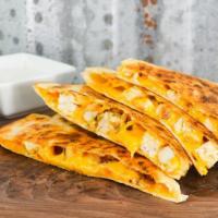Homemade Quesadilla · Grilled tortilla and cheddar cheese. Choose plain, grilled chicken or philly style steak (at...