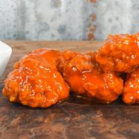 Boneless Chicken (10 ct)  · Includes your choice of wing sauce: honey BBQ, mild, hot, or sweet Thai chili, or chipotle B...