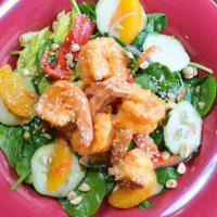 Sweet Thai Chili Shrimp Salad · Chopped romaine, shredded carrots, cucumbers, thin sliced red onions, red peppers, orange se...