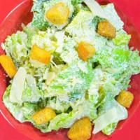 Caesar Salad · Fresh crispy romaine lettuce, homemade croutons and grated Romano cheese, tossed with our ho...