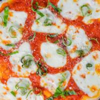 Margherita Pizza · Fresh Italian tomato sauce topped with grated Romano cheese and fresh mozzarella garnished w...