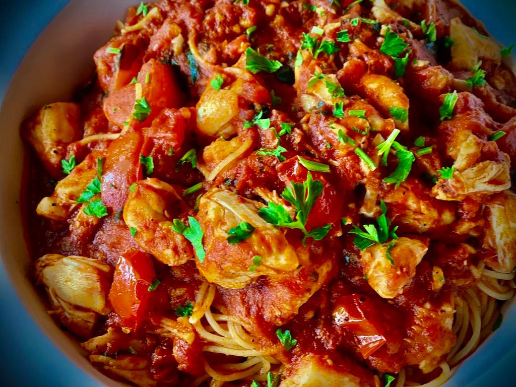 Capellini Positano · Fresh cherry tomatoes sauce marinara with garlic and jumbo lump crab meat over angel hair pasta.