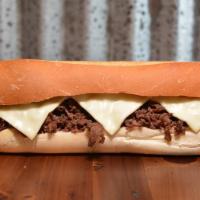 Cheesesteak Sandwich  · Chopped steak, melted American cheese. 