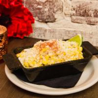 Mexican Street Corn · Local sweet corn, Cotija, mayo, chile, paprika and lime.