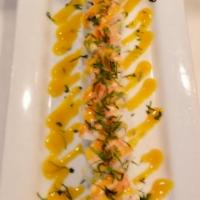 Golden Tiger Roll · California roll topped with shrimp, avocado & cilantro mango sauce.