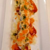 Fire Cracker Roll · Spicy crawfish, avocado, cucumber topped with crab, tempura flakes, scallions, smelt fish eg...