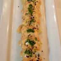 Texas Tornado Roll · Yellowtail, cream cheese, jalapeno, deep-fried then topped with scallions and sweet mayo sau...