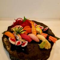 Sushi and Sashimi Combination · 14 pieces and tuna roll.