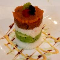 Ahi Tower · A gorgeous tower with layers of rice, avocado, crab, spicy tuna and caviar.