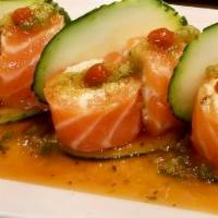 Butterfly Kiss · Crabmeat wrapped with fresh salmon sashimi, topped with our sweet apple sauce.