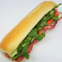 Cured Pork Banh Mi · Vietnamese style 3 layer ham, house mayo, pickled carrots, cucumber, jalapeno, pepper, and c...