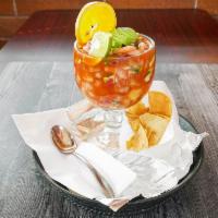 Shrimp Cocktail · Prawn cocktail, prawn shrimp, mixed in tomato and clam juice, fresh-cut tomatoes, avocado an...
