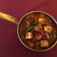 Kadai Paneer- ( gluten free) · Homemade cheese cooked with bell pepper, tomatoes, onion, ginger and garlic in a special ble...