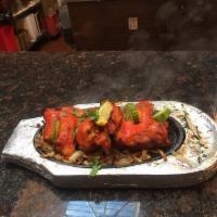 Special Tandoori Chicken- gluten free · Fresh chicken legs marinated overnight with home  made  yoghurt and spices and cooked in cla...