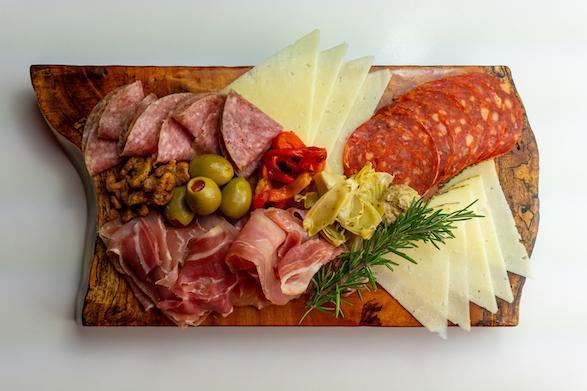 House Board · Prosciutto, chorizo, sopressata, Asiago and manchego cheeses. Served with Pita and Olives