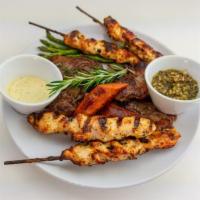 Parrillada Entree · Churrasco, Chicken, and Chorizo, w/ Chimichurri, Served with Fries