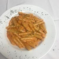 Penne Alla Vodka · Served with bacon bits.