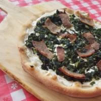 Ricotta Pizza · Comes with spinach, caramelized onions and sausage.