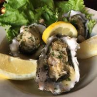 BBQ Oysters · with garlic butter, parsley & Parmigianino Reggiano cheese.  Garlic bread 