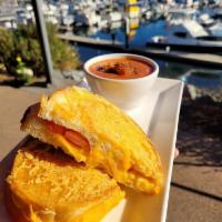 Grilled Cheese and Tomato Sandwich · Grilled Swiss, cheddar, with tomato on Parmesan sourdough.