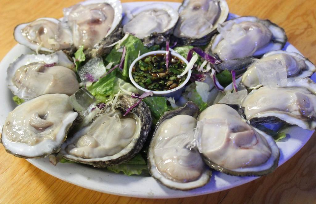 Fresh Oysters · Enjoy them with our special sauce, lime juice and salt.