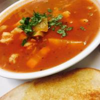 Fish Soup · Served with fish fillet and veggies.