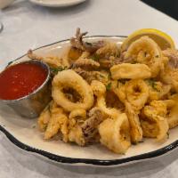 Fried Calamari · Rings and tentacles served with lemon wedges and marinara sauce. Feeds 1-2 people 