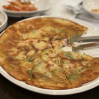 3. Seafood Pancake · Crispy Korean-style pancakes with seafood and scallions.