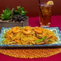 28. Singapore Noodles · Stir fired rice noodle in curry sauce with roasted pork and shrimp. Does not include rice. H...