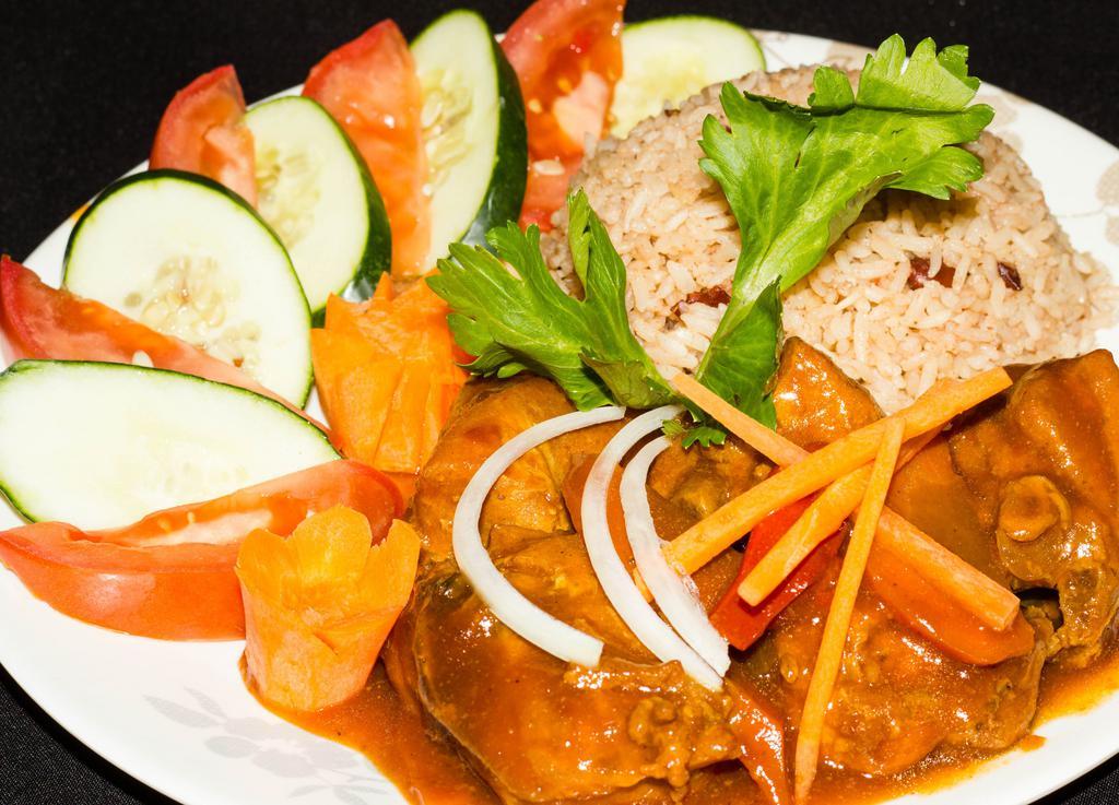 Curry Chicken · Served with your choice of white rice, rice & peas, vegetables or ground provisions. (Oxtail gravy is not available)