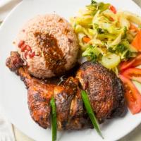 Jerk Chicken  · Served with your choice of white rice, rice & peas, vegetables or ground provisions.
