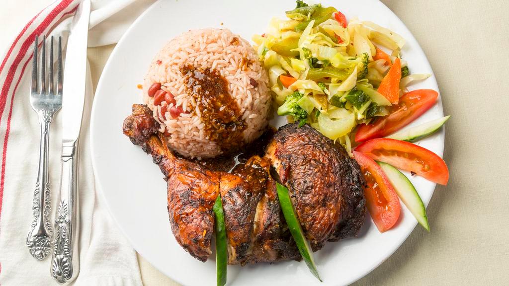 Jerk Chicken  · Served with your choice of white rice, rice & peas, vegetables or ground provisions.