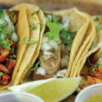 Taco · 1 Corn tortilla filled with choice of meat topped with onion & cilantro.