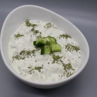 Yogurt with Cucumbers · cucumbers, dried mint, salt & white pepper mixed with thick yogurt.