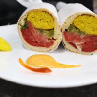 Ground Chicken Sandwich · Charbroiled ground chicken kabob made into an amazing sandwich with pickles, tomatoes, parsl...