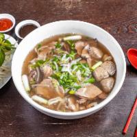 2. Pho Dac Biet Bo Vien  · Large. Special combo with rare thin slices of steak, well-done brisket, flank, tendon, tripe...