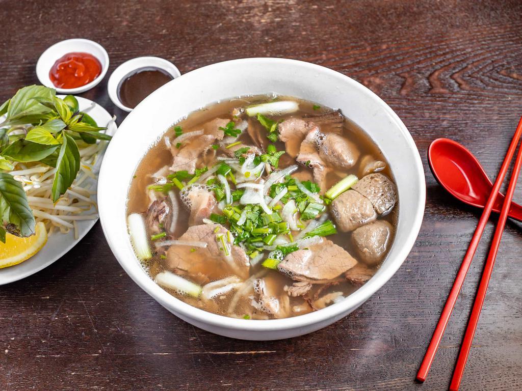 2. Pho Dac Biet Bo Vien  · Large. Special combo with rare thin slices of steak, well-done brisket, flank, tendon, tripe & beef meat balls.